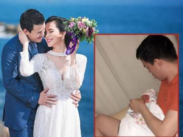 Hình ảnh đại gia mía đường - chồng Sang Lê cho con bú khiến người hâm mộ thích thú