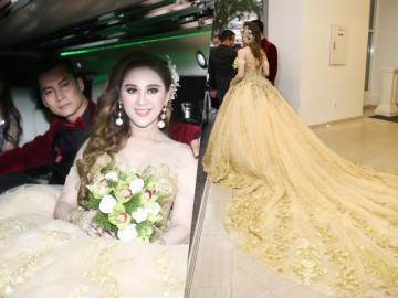 Lâm Khánh Chi mặc váy cưới dài quét đất, cùng chồng đi xe Limousine tới tiệc cưới