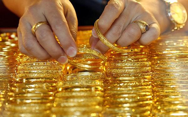 Vì sao vàng được dự báo giảm mạnh tuần này? - 1