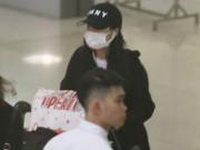 Làng sao - Nhã Phương che kín mặt về Việt Nam giữa ồn ào tình cảm Trường Giang - Nam Em