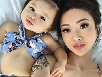 Mẹ trẻ xinh xuất sắc gây sốt với bộ ảnh nằm tạo dáng ngộ nghĩnh cùng con gái