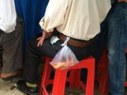 Eva tám - Cay mắt với hình ảnh ông bố đi ăn cỗ lấy phần cho con