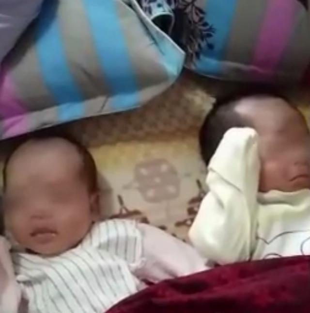Cặp vợ chồng đem bán cặp con sinh đôi 2 tháng tuổi với giá 400 triệu để trả nợ - 1