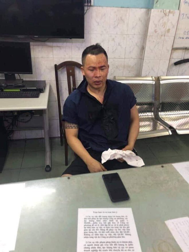Thực hư bức ảnh Vũ Khắc Tiệp bị đánh, ngồi trong đồn công an - 1