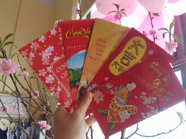 Tết Nguyên Đán 2020: Lấy tiền lì xì của con, bố mẹ có thể bị phạt đến 1 triệu đồng - 1