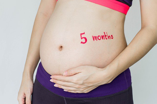 Bụng căng cứng khi mang thai tháng thứ 5 do đâu, có nguy hiểm không? - 1