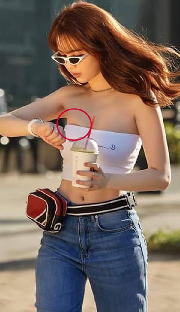 Diện váy gợi cảm, Ngọc Trinh bất cẩn để lộ miếng dán ngực kém tinh tế - 9