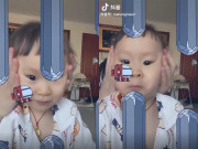 Clip Eva - Bé gái bị bố dùng cả khuôn mặt để chơi game, biểu cảm đáng yêu hết phần thiên hạ