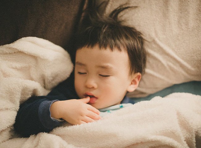 A 4 year old baby stops breathing after a nap, which is caused by a habit many children often have - 4