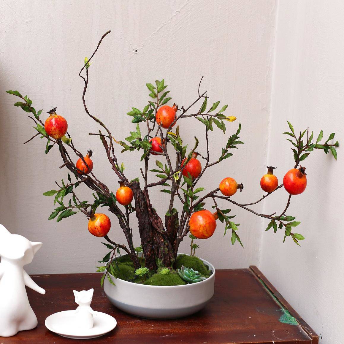 Lý do phong thủy khiến chị em rần rần mua cây lựu giả về trưng Tết - 3