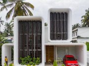 Nhà đẹp - Độc đáo ngôi nhà hình chiếc điện thoại di động, dùng cửa chớp trục xoay để thông gió