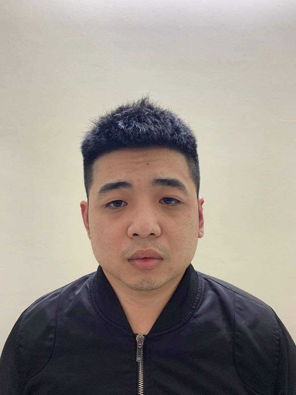 Chân dung đối tượng Tạ Thái Long tại trụ sở công an.