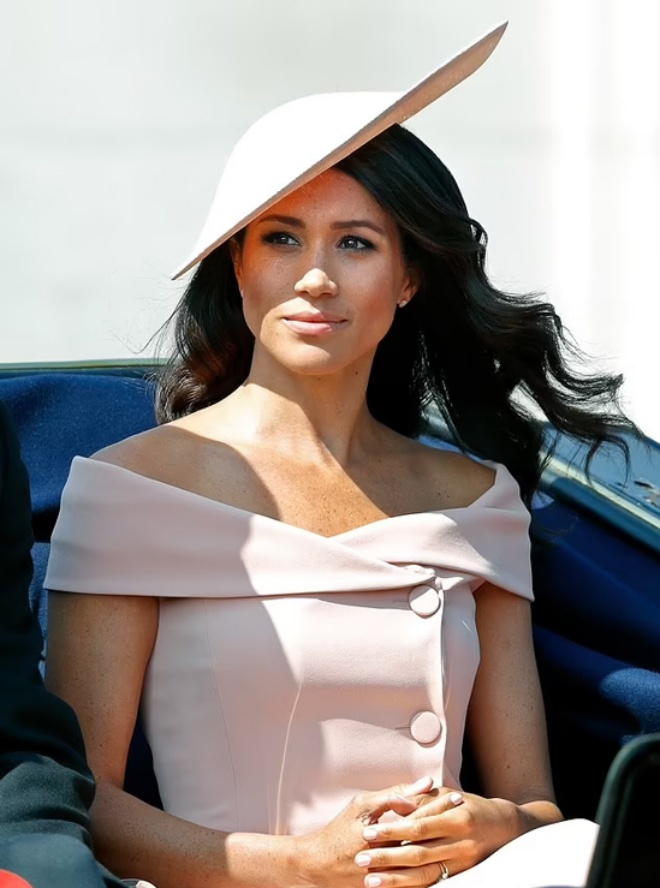 The Princess character in the movie wears the exact same outfit as Meghan.