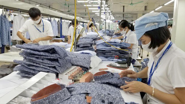 Một số địa phương đề xuất tăng lương tối thiểu vùng năm 2024 cho công nhân. Ảnh minh họa: Phạm Thanh