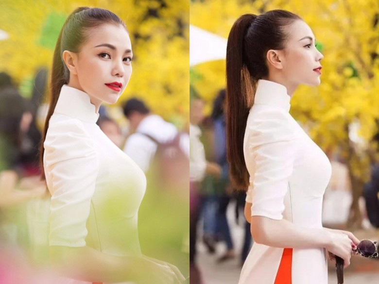 Woman with a high ponytail in an ao dai