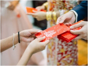 Bà bầu - Bí mật trong chiếc phong bì thưởng Tết cho 2 con dâu, phần của chị dâu vô sinh đầy bất ngờ