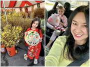 Yêu con - Con gái "Nữ hoàng ảnh lịch" Y Phụng được mẹ diện áo dài, đội nón lá, đi chợ xuân ở Mỹ để đón Tết Việt sớm