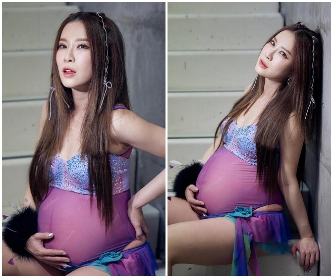 Nữ nghệ sĩ ôm bụng bầu lên sân khấu.