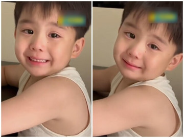 Mẹ báo sắp đi làm xa, bé trai phải ở nhà với ông bà rưng rưng nước mắt nhưng gượng cười để mẹ yên lòng