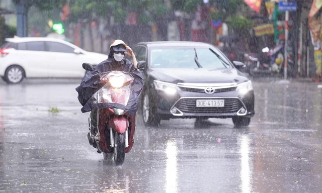 Từ đêm nay miền Bắc chuyển mưa rét do đón không khí lạnh.