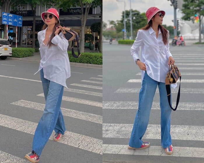 Một set đồ kinh điển mà Thanh Hằng thường diện chính là quần jeans phối với áo sơ mi. Chiếc quần jeans ôm vừa phải kết hợp cùng áo sơ mi oversized mang đến vẻ ngoài phóng khoáng, thanh thoát nhưng vẫn cực kỳ thời thượng.