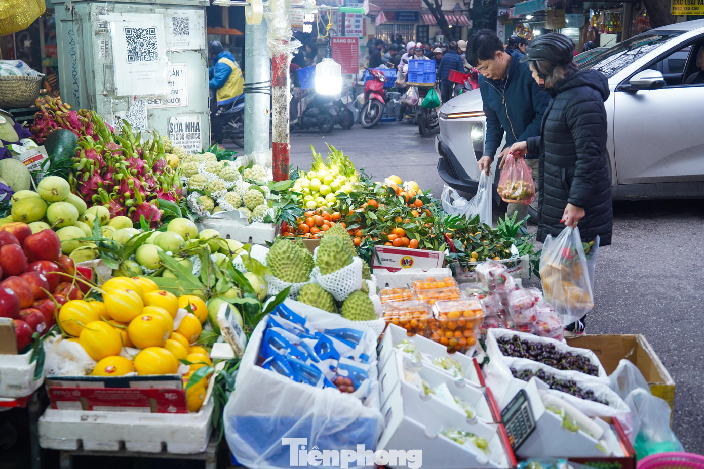 Người Hà Nội tất bật sắm lễ cúng tiễn ông Công, ông Táo - 17