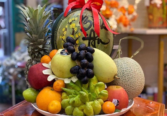 Trong mâm ngũ quả ngày Tết thường không thiếu quả xoài với ý nghĩa mang lại may mắn, dư dả. Ảnh TL