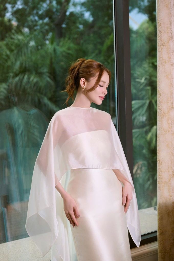 Bà mẹ ba con được khen vóc dáng sau sinh.