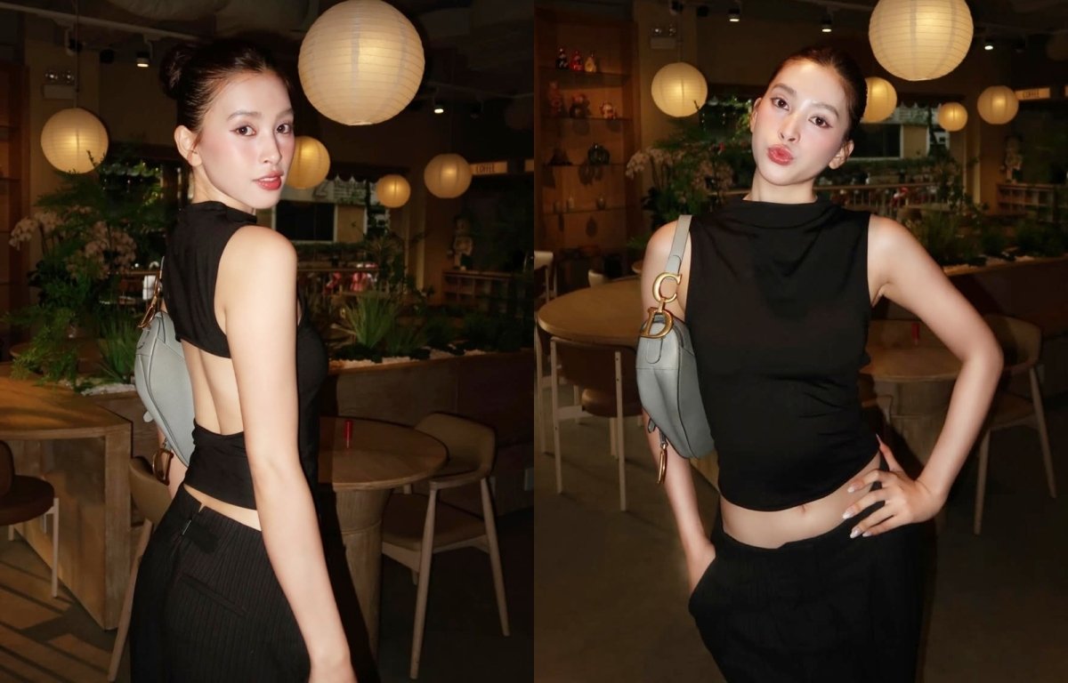 Hoa hậu Tiểu Vy diện mốt áo cut-out không nội y, kết hợp quần ống rộng đồng màu, nhấn bằng túi Dior.