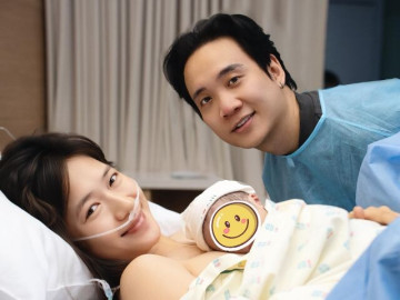 JustaTee tung ảnh kề cận vợ hot girl lúc đón con thứ 3 nhưng bị nghi là "hàng giả", nhóc tì mới chào đời giống hệt bố