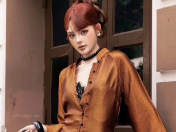 "Áo dài" mở khuy lộ nội y gây bàn tán