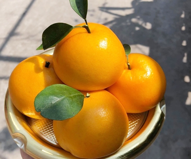 Quả cam thu h&uacute;t may mắn, sự b&igrave;nh an v&agrave; ph&uacute;c thọ