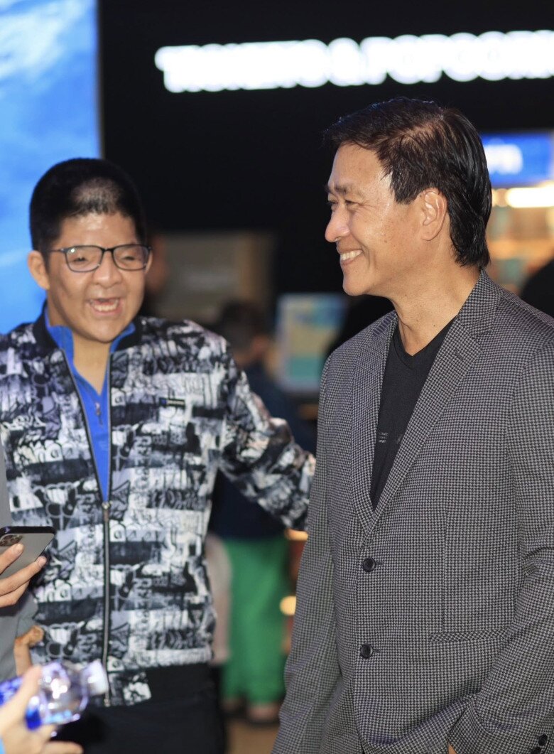 Quốc Tuấn và con trai xuất hiện tại showcase Mùi Phở cuối tháng 12/2025.