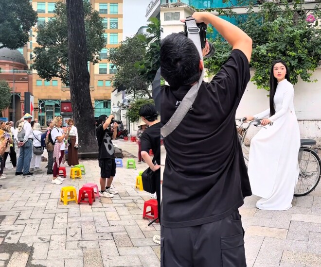 Lọ Lem được người đi đường vây kín ngắm nhìn khi mặc áo dài xuống phố.