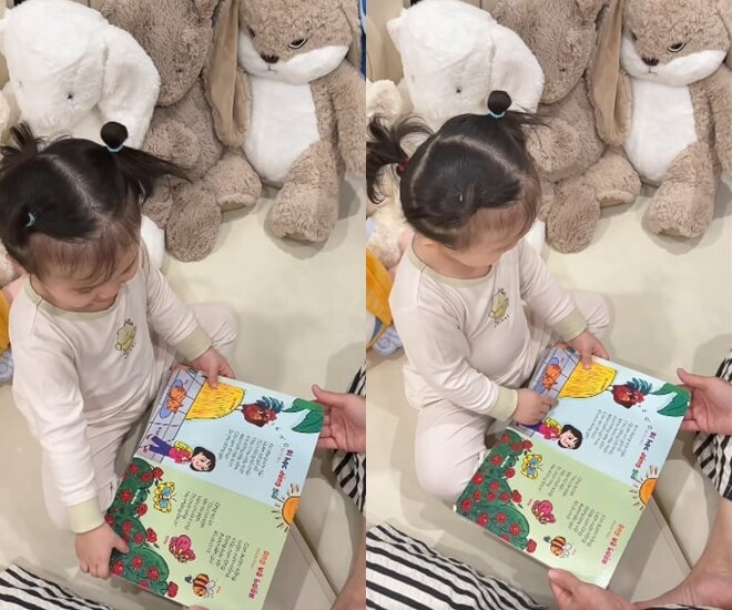 Con gái Sam mới 2 tuổi đã chỉ chính xác hết các thông tin trong sách gây ngưỡng mộ. 