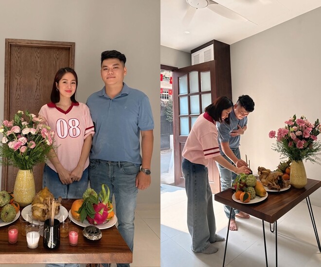 Lê Phương và chồng làm lễ cúng khi chuyển vào căn nhà mới.