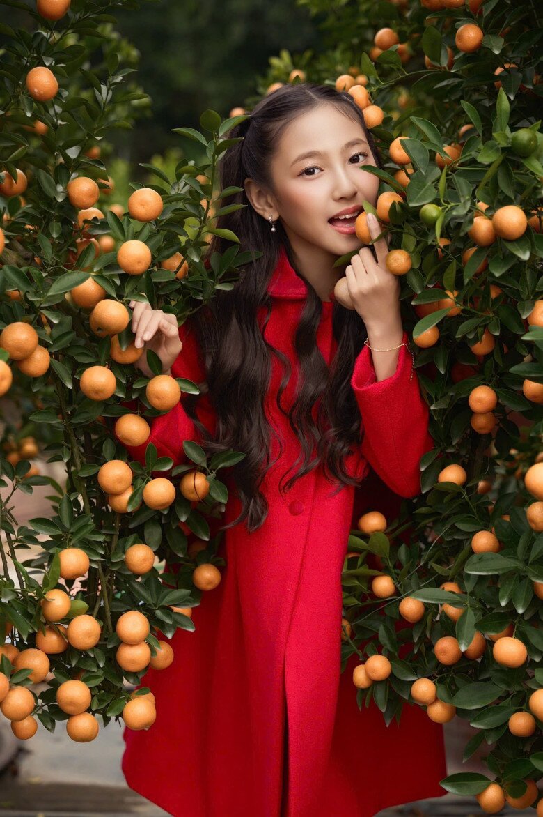 Cũng nhờ hoạt động này của mẹ mà bé Viann trở nên thích thú hơn với  mỗi dịp Tết Nguyên đán. 