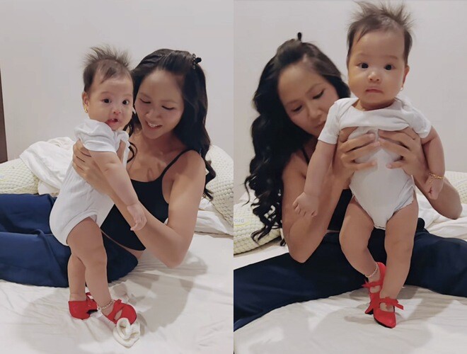 Con gái 5 tháng tuổi của Hoa hậu Hamp;#39;Hen Niê đeo vàng bạc đầy người, biểu cảm hài hước khi đi giày cao gót - 1