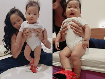 Yêu con - Con gái 5 tháng tuổi của Hoa hậu H'Hen Niê đeo vàng bạc đầy người, biểu cảm hài hước khi đi giày cao gót