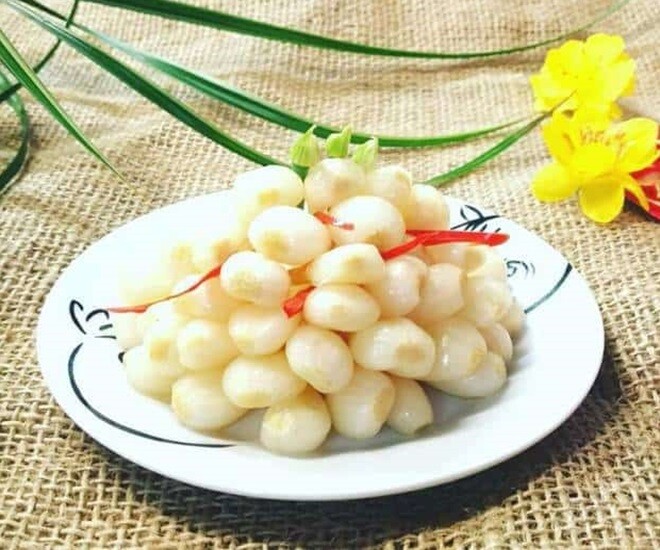 Dưa hành, củ kiệu muối là món ăn chống ngán được nhiều người ưa thích dịp Tết. Ảnh minh họa. 