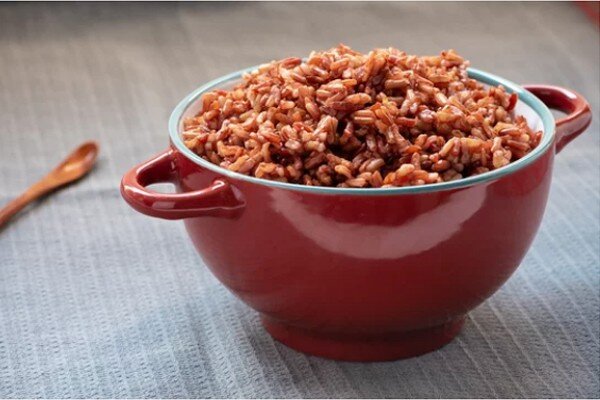 Thay vì bánh chưng, bánh tẻ thì cơm được nấu từ gạo huyết rồng vừa tốt, vừa mang lại tài lộc và may mắn. Ảnh minh họa. 