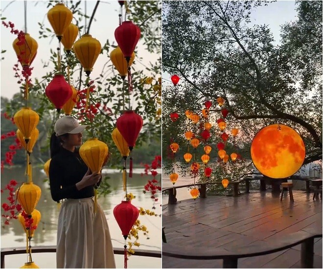 Những chiếc đèn vàng, đỏ đan xen cùng biểu tượng cung trăng cũng đã được dựng lên. Vân Trang đã khéo léo tận dụng không gian bờ sông và giữ lại tối đa mảng xanh thiên nhiên làm khung cảnh trở nên lãng mạn.