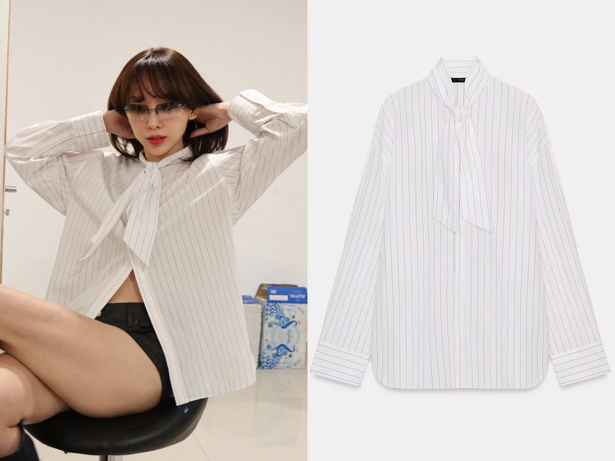 Người đẹp sinh năm 1989 tôn dáng gầy cùng sơ mi phanh cúc phối quần shorts một gang tay.