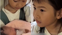 Xôn xao cảnh bé gái 6 tuổi xinh xắn ngồi ôm đứa bé sơ sinh ở hành lang bệnh viện, đau lòng chuyện phía sau