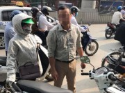 Tin tức - Va chạm giao thông, nam tài xế đi ô tô bắt đền không được liền vứt chìa khóa của người phụ nữ đi xe máy