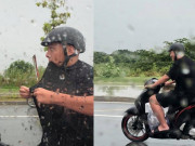 Tin tức - Chồng bắt vợ đi taxi rồi đội mưa chạy xe theo gây thích thú, danh tính mới bất ngờ