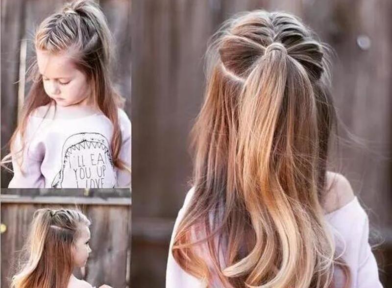 Nếu bé gái nhà bạn có mái tóc dài thì hãy thử ngay kiểu tóc buộc đuôi ngựa này.
