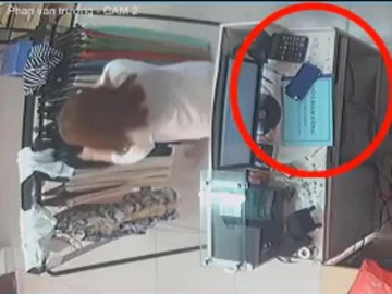 Nữ quái ra tay trộm iPhone nhanh như chớp trong cửa hàng quần áo