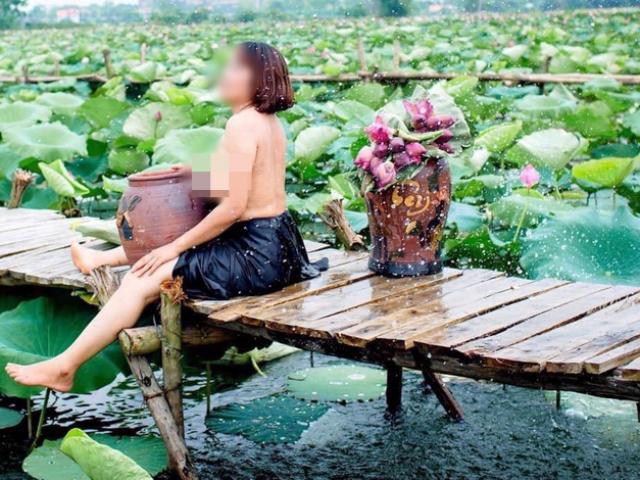 Thêm một phụ nữ U50 cởi trần, ngực chảy xệ chụp ảnh bên hồ sen bị ném đá dữ dội