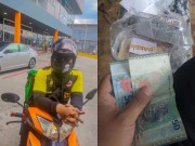 Tin tức - Tận tâm đi giao bánh giữa trời mưa bão, anh shipper nghẹn ngào khi mở chiếc phong bì khách đưa